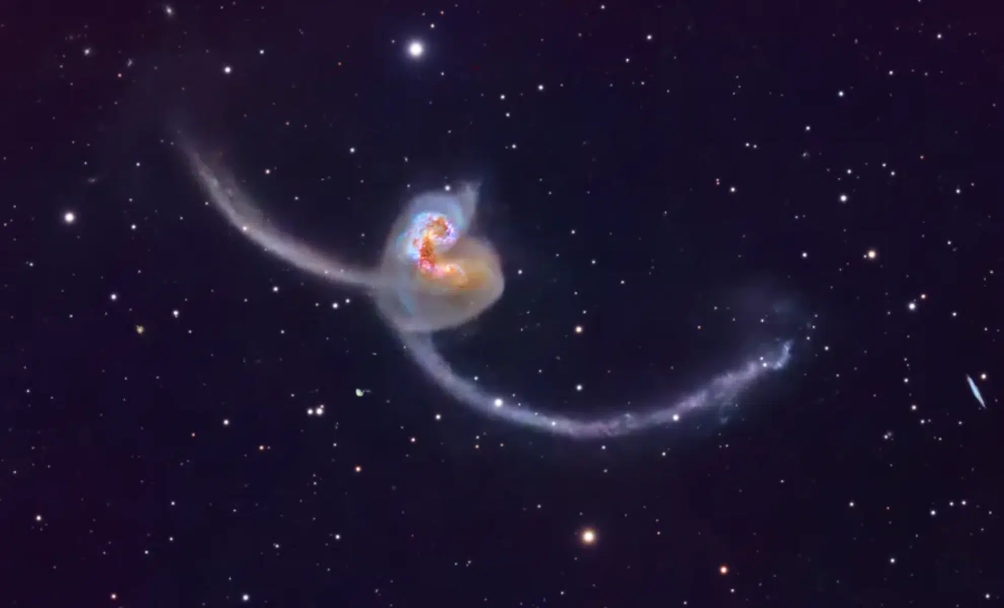 Astronomers Catch Two Necks on a Colliding Road with Amazing Deep Space Imagery.