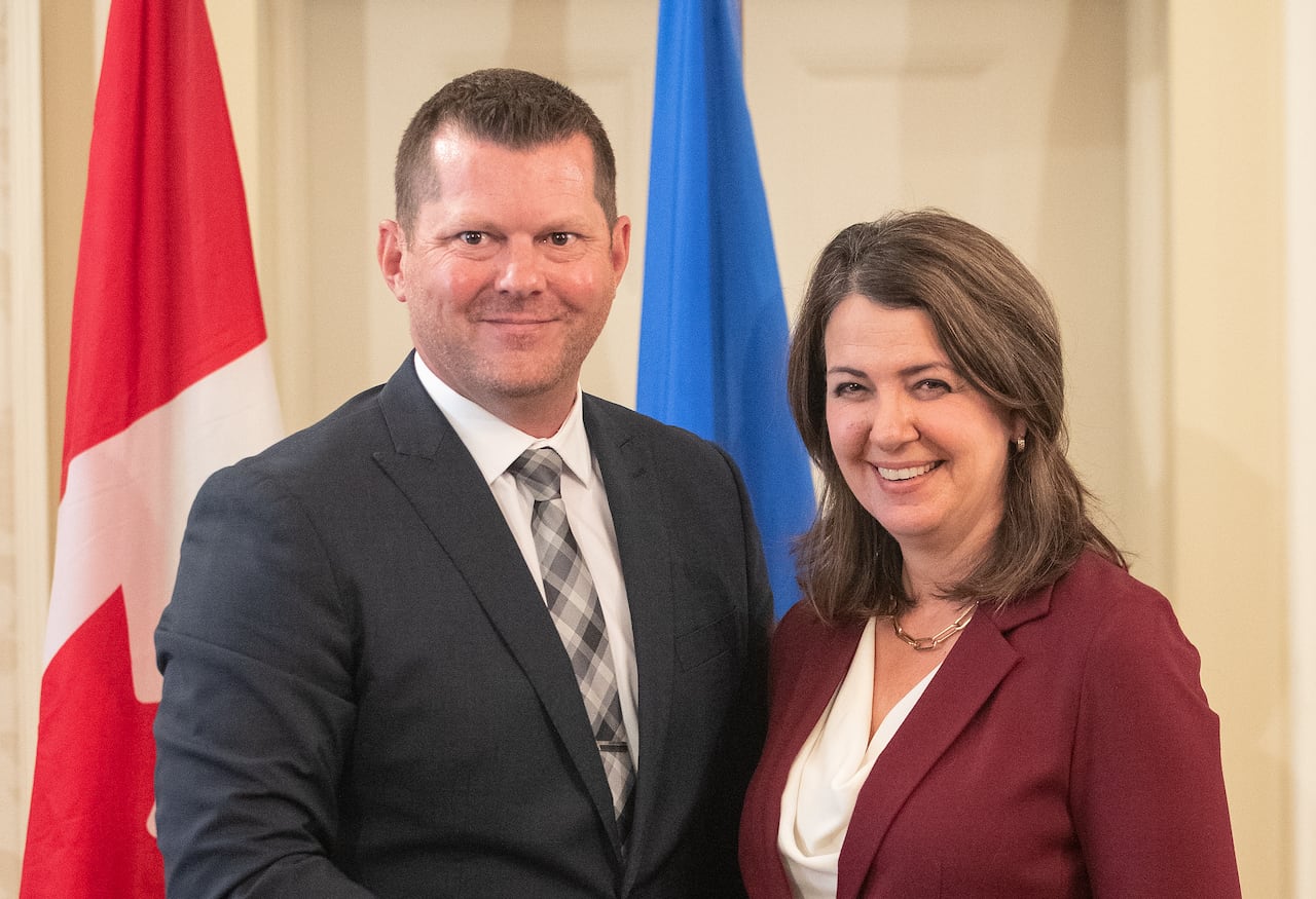 Alberta Premier Danielle Smith and Agriculture and Irrigation Minister RJ Sigurdson pose together during the swearing-in of her cabinet, in Edmonton, Friday, June 9, 2023. THE CANADIAN REPORTER/Jason Franson.