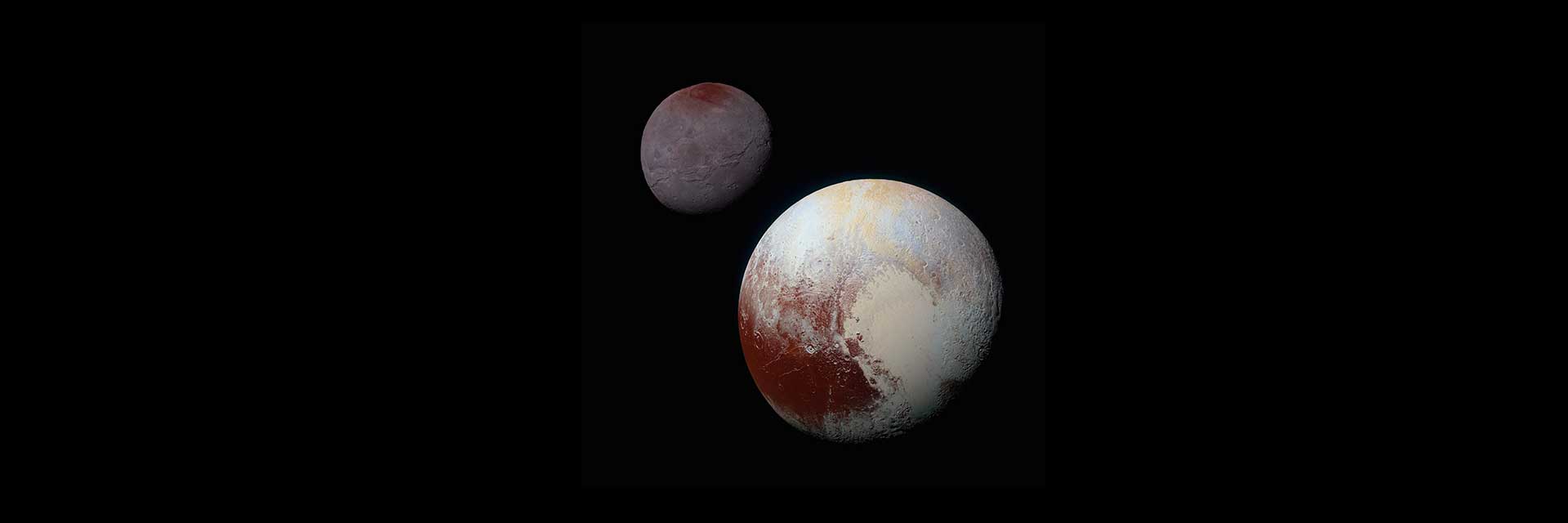 An image of Pluto and its moon Charon, the small red and white planets in the darkness of space.