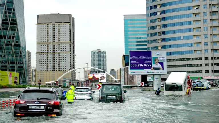 Cars are stuck on a flooded Dubai street after heavy rains. Image: AP